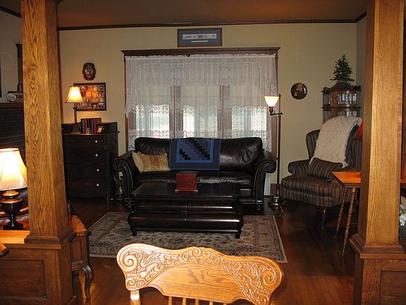 Living Room
						:
						Fireplace with french doors on either side, built in bookcase - all Oak trim.