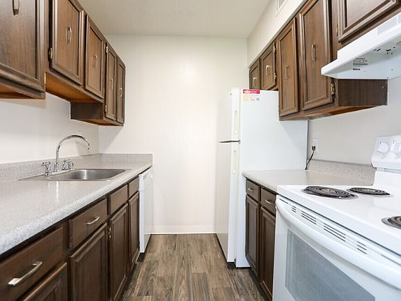 The kitchen offers ample storage space, making it an ideal environment for organizing your cooking essentials and ingredients.