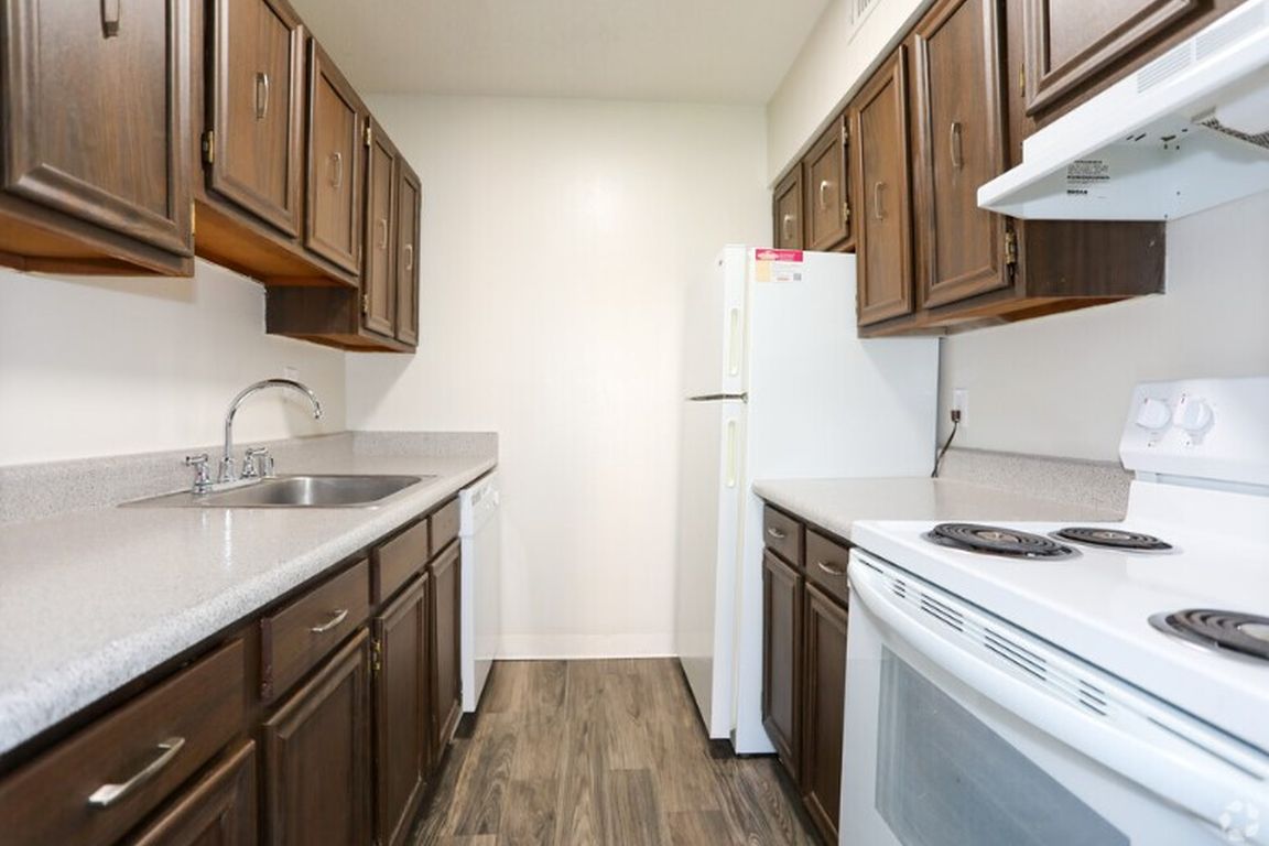 The kitchen offers ample storage space, making it an ideal environment for organizing your cooking essentials and ingredients.
