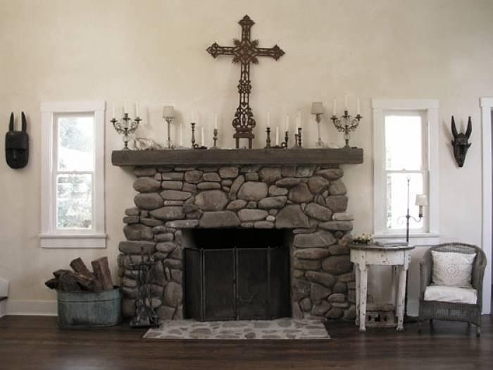 Great room with 16' ceiling, hardwood floors, 2 ceiling fans and river rock wood burning fireplace with gas starter for easy lighting.