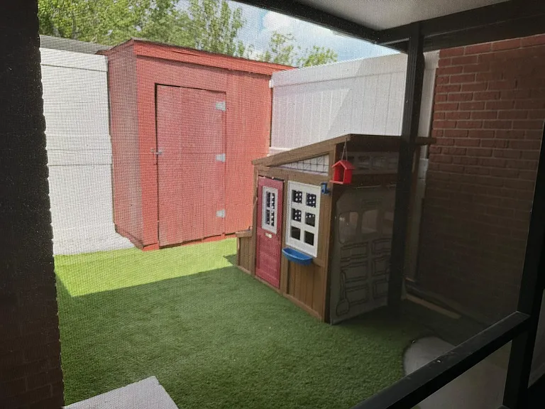 KIDS PLAYHOUSE AND STORAGE AREA.