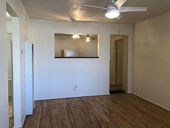 living room facing into kitchen