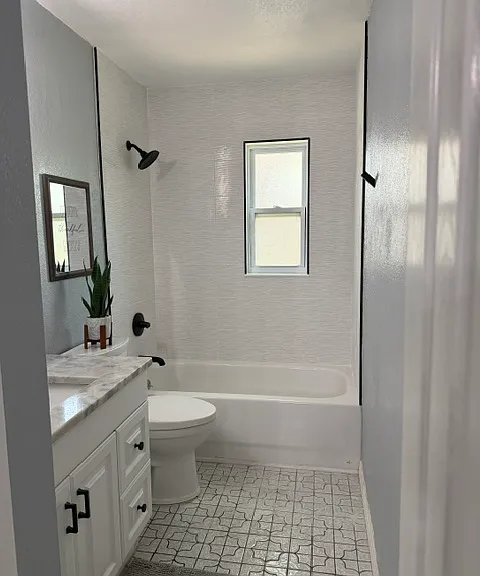 Newly tiled and upgraded bathroom.