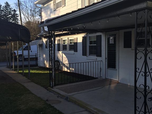 Patio, grass yard, parking carport