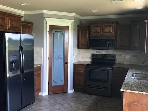5th image of 9800 Tall Pine Ln