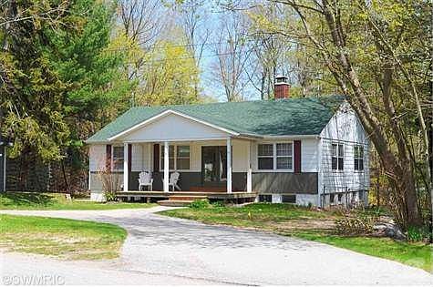 very nicely renovated home with a large fenced in yard.