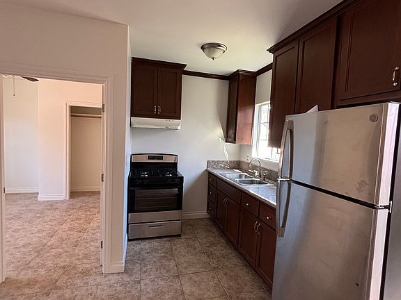 Kitchen, leading into bedroom