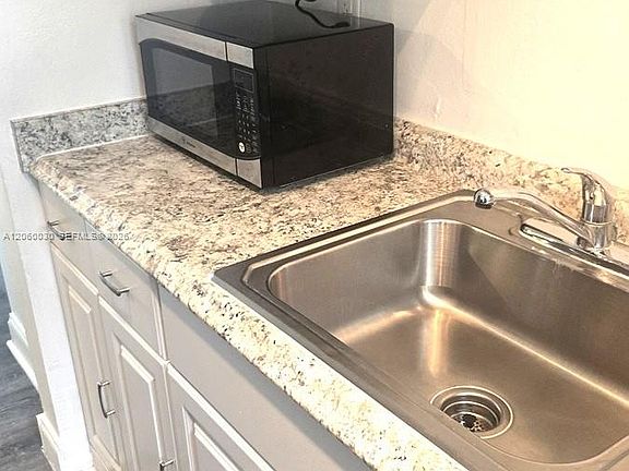 4th image of 7720 Harding Ave APT 9