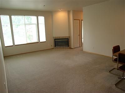 Spacious living area has gas fireplace 