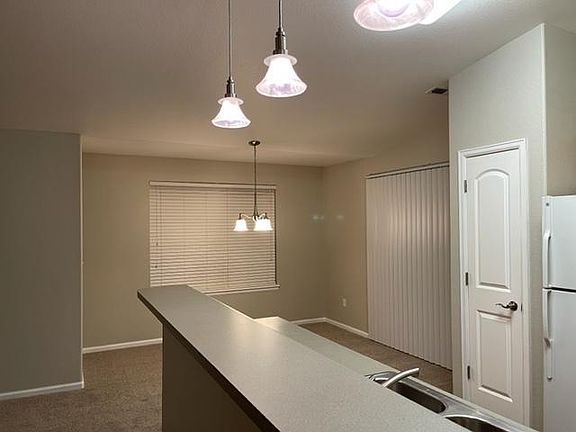 Entertain your guests with an open floor plan that allows for easy conversation between the kitchen, dining, and living rooms. During the day, the unit is full of natural light, with ample windows and doors.