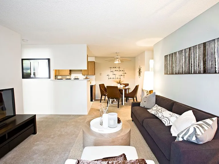 Living area with carpeted flooring