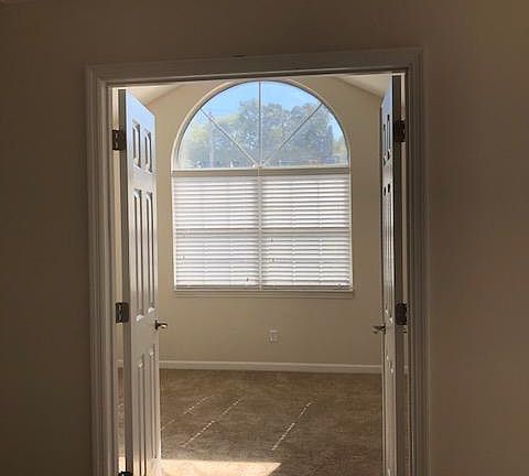 2nd bedroom or den with double doors and a bright view!