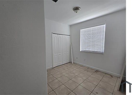 1st image of 1661 SE 29th Ct Unit 203