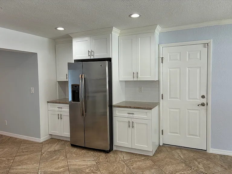 Superb amount of kitchen counter space, enough for a coffee bar and more