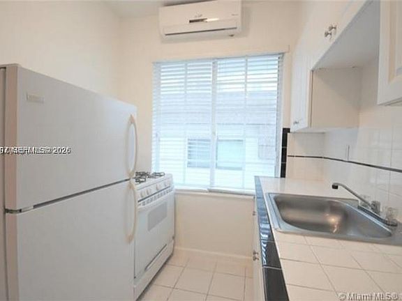 5th image of 7936 Harding Ave APT 5
