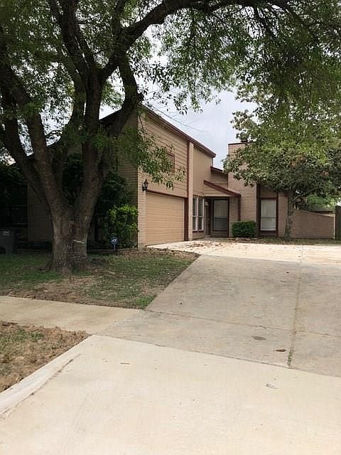 Brand New Driveway recently poured. Side swing garage provides ample parking