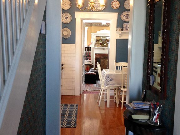 Front hall through library