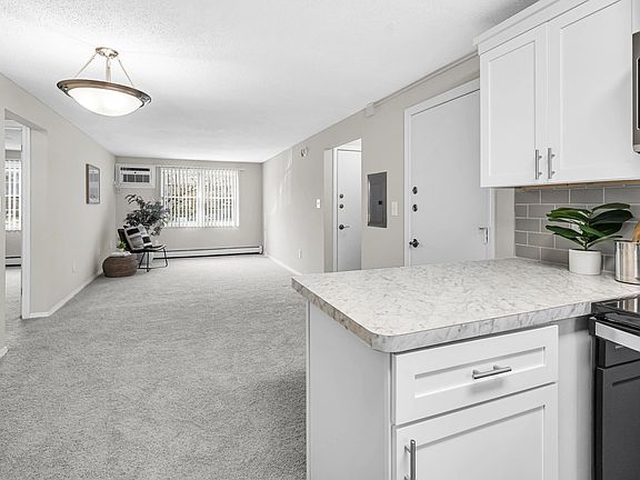 Some kitchens boast a charming breakfast bar, perfect for leisurely mornings.