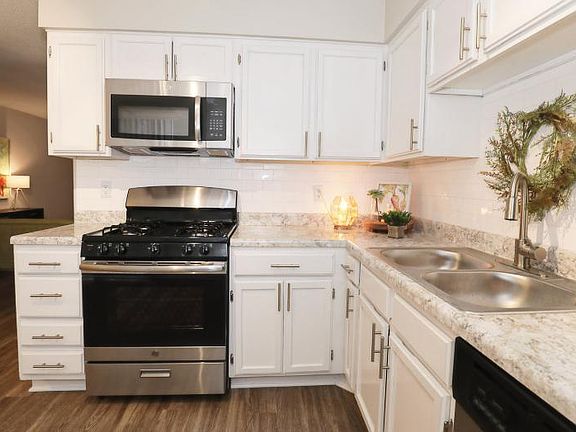 Updated sleek kitchen with stainless steel appliance package