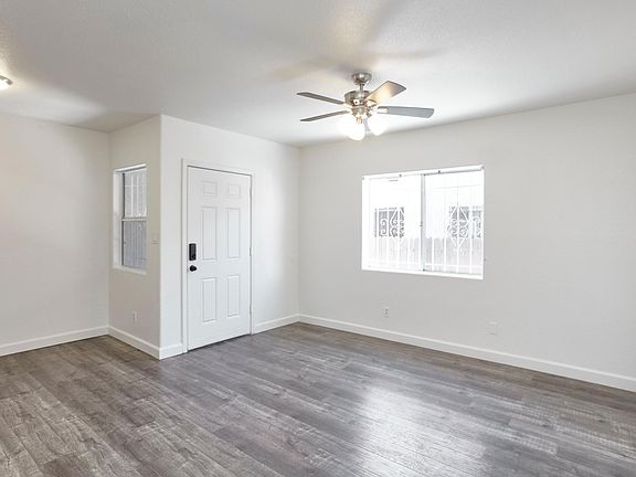 livingroom and dining nook as seen from hallway