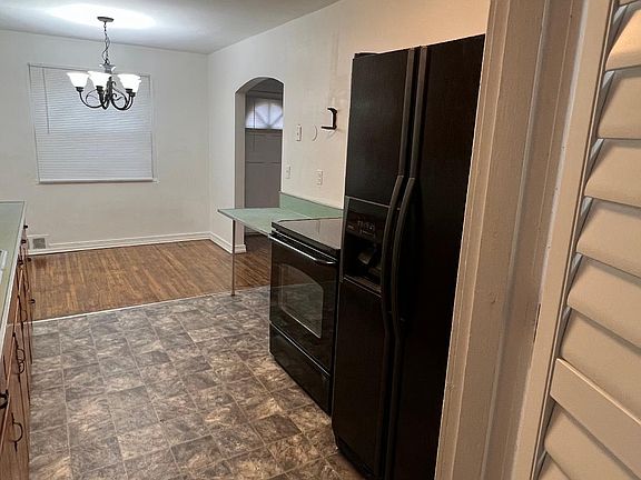 Kitchen New Flooring Refrigerator and Stove