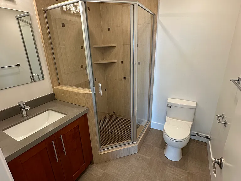 Primary Bath with Rain Shower Head.