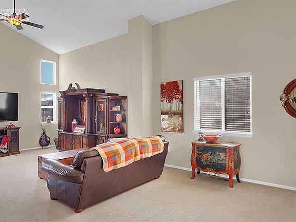 The huge great room has vaulted ceilings and large windows!