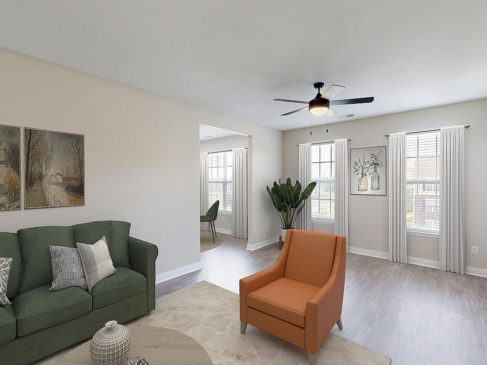 Newly Renovated Living Room with Hardwood-Style Flooring