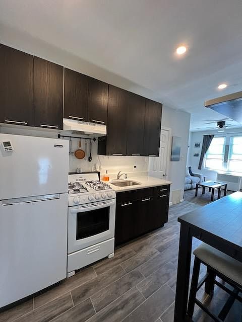 1st image of 5839 78th St Floor 2