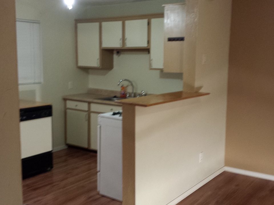 kitchen with hand finished wood bar