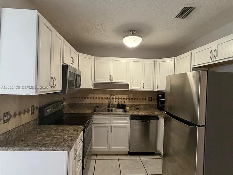 9116 NW 35th Pl #0 — Photo 6