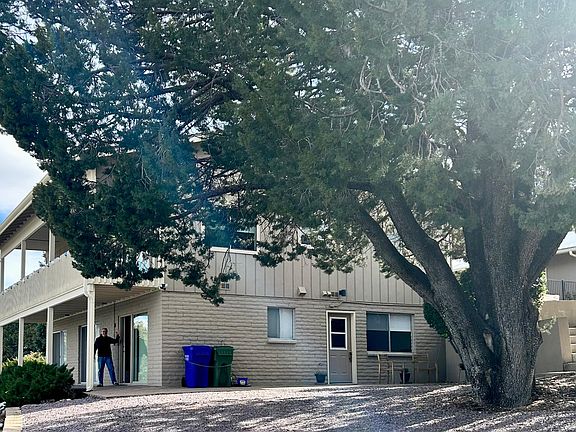 Welcoming wave from (on-site) owner and view of parking area.