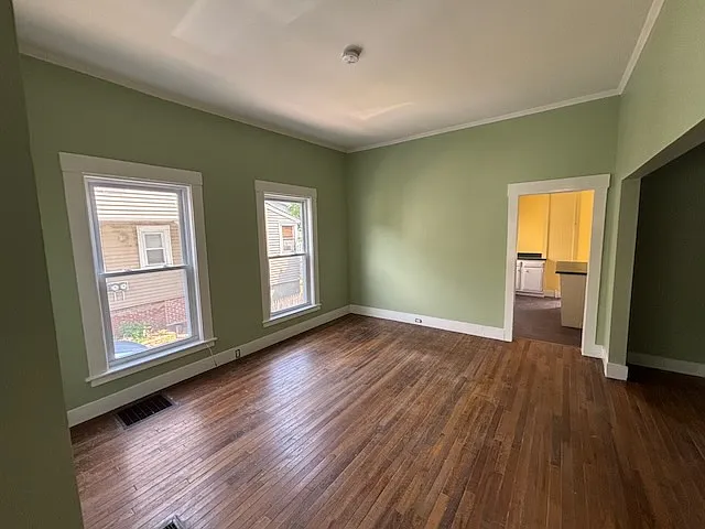 Living room looking into kitchen