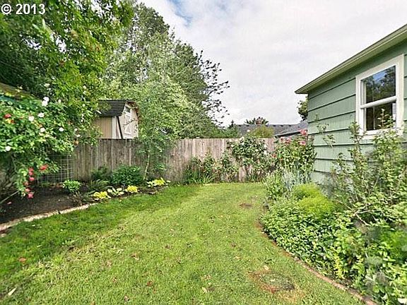 shared backyard with organic vegetable garden
