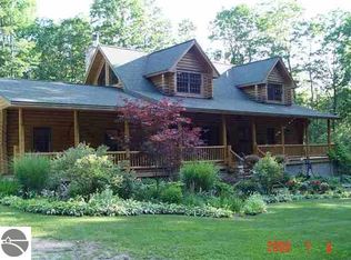 12006 E Tatch Rd, Omena, MI 49674