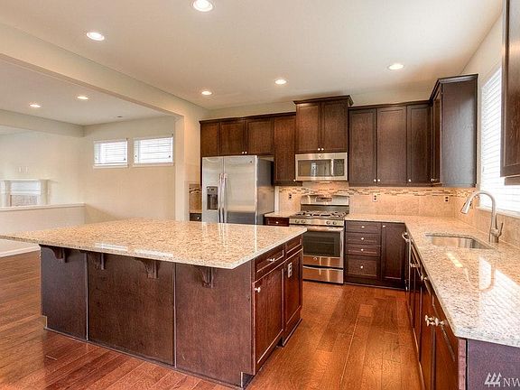 Expansive Kitchen with quartz island