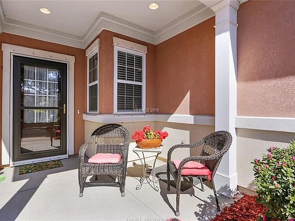Enjoy the cozy front porch with an early morning cup of coffee.