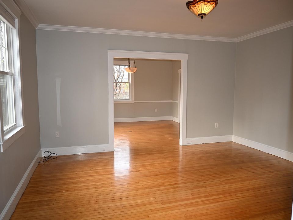 Living room with view into dining room