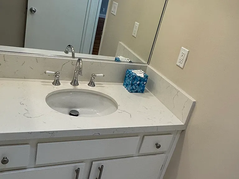 Bathroom sink with Carrera Marble counter top