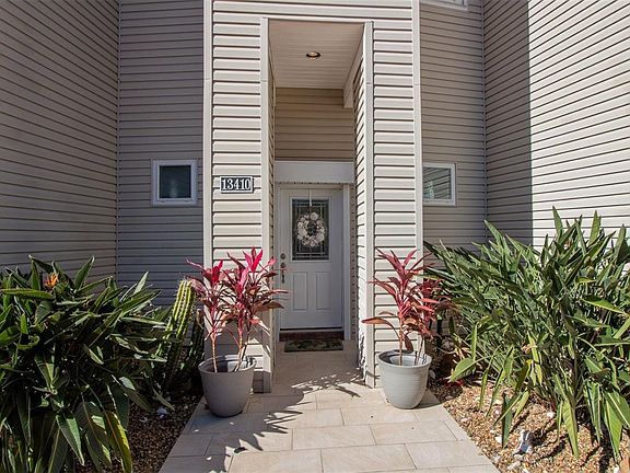 Welcome to 13410 Binnacle Way in Lafittes Cove