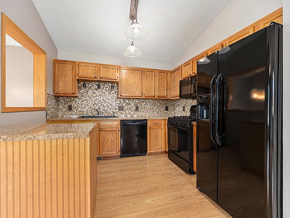Kitchen with window to entry