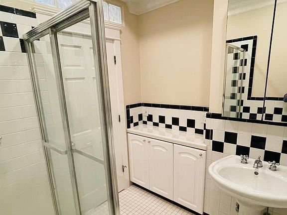 Bath with extra storage cabinets
