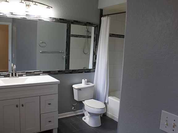 M Bath with new tile, sink