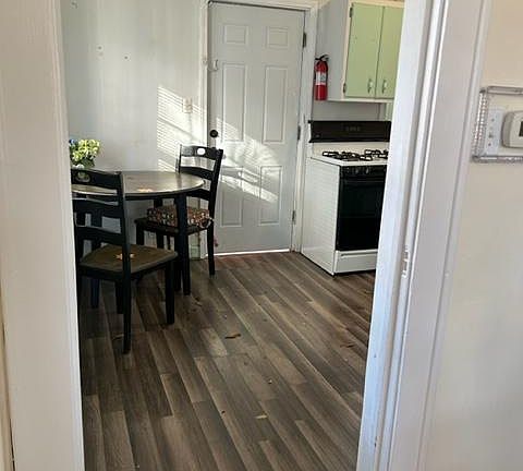 Showing part of the kitchen, door opens up to a huge deck for cookouts in privacy.