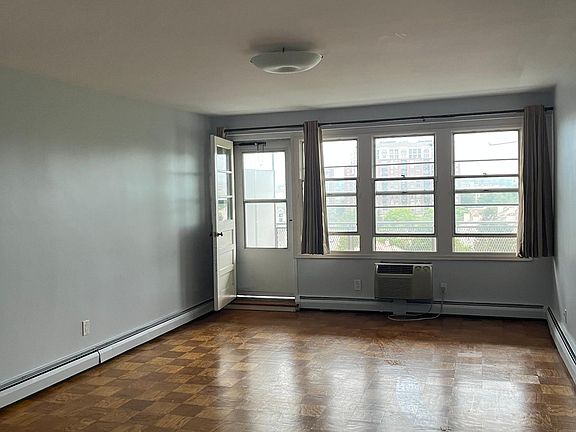 LIving Room Area with Access to Large sized Balcony