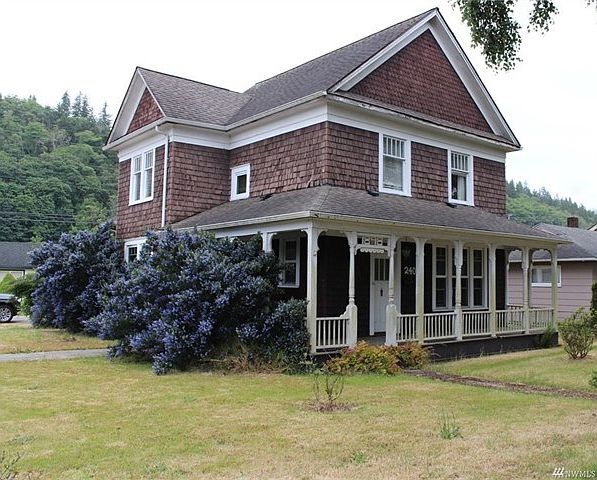 Vintage Charmer in Hoquiam! Wrap around porch and detached 2 car garage.
