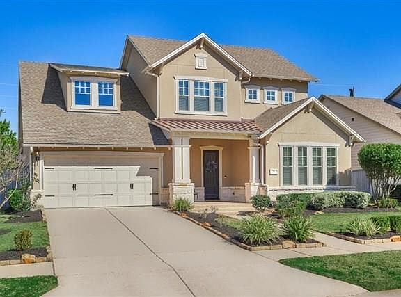 Beautiful stucco and stone David Weekly 2014 built home in Liberty Branch, The Village of Creekside Park