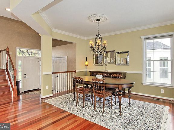 Elegant Dining Room with decorative moldings.