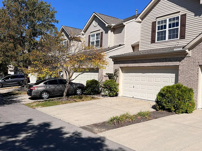 Nice two car garage with garage door opener.