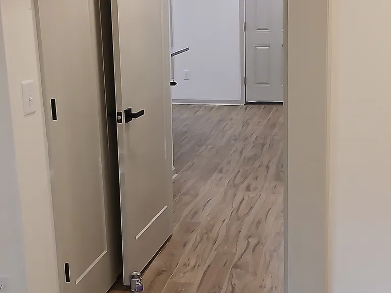 2nd bedroom and closet looking towards front of home